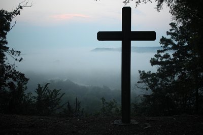 The cross in mist
